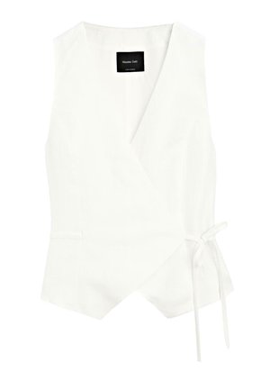 White sleeveless wrap top featuring a deep V-neck, side tie, and subtle texture, with a black brand label inside the neckline.