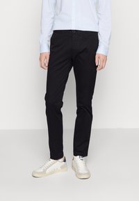 Tommy Hilfiger - BLEECKER PIMA - Chino-püksid - black Väikepilt 1