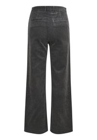 Pantalons en velours côtelé à jambes larges dans un gris foncé. Comprend des côtes verticales, deux poches arrière et une taille lisse. La texture semble douce.