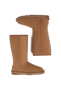 Tan anklehohe Stiefel aus weichem, strukturiertem Material mit einer glatten Sohle und sichtbaren Nähten entlang der Nähte. Rundspitzendesign.