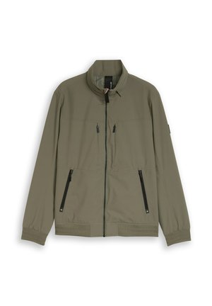 Leichte olivgrüne Jacke mit Stehkragen, schwarzen Reißverschlusstaschen, Frontreißverschluss sowie elastischen Bündchen und Saum.