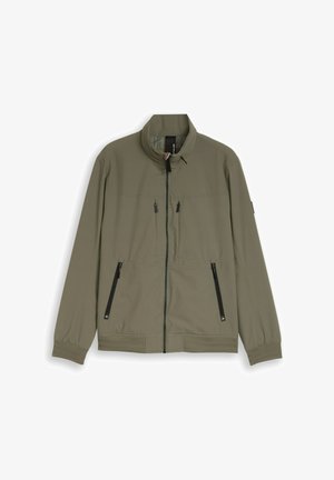 Leichte olivgrüne Jacke mit Stehkragen, schwarzen Reißverschlusstaschen, Frontreißverschluss sowie elastischen Bündchen und Saum.