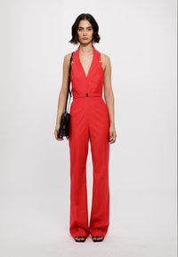 Materiel BUCKLE BELT JUMPSUIT - Macacão - red