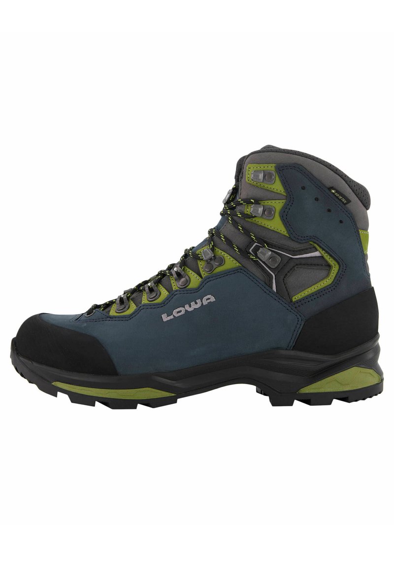 Scarponi da trekking di colore blu scuro con accenti verdi; realizzati in materiale sintetico resistente; dotati di puntale rinforzato e supporto alto alla caviglia.