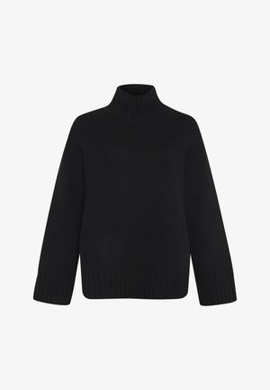 Pull en tricot noir avec un col roulé haut, des épaules tombantes, et des poignets et un ourlet côtelés. Texture douce et silhouette oversize.