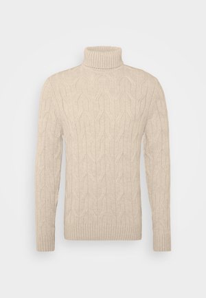 Pull à col roulé beige avec un motif de tricot texturé, des poignets à côtes et un ourlet. Fabriqué à partir d'un tissu doux, il présente une silhouette ajustée.
