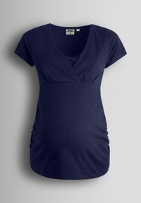 Haut de maternité bleu marine avec col en V, manches courtes, côtés froncés et tissu doux pour le confort. Idéal pour s'adapter à un ventre qui s'arrondit.