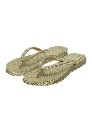 Gold woven flip-flops with rhinestone-embellished straps, flat sole, and textured braided design.