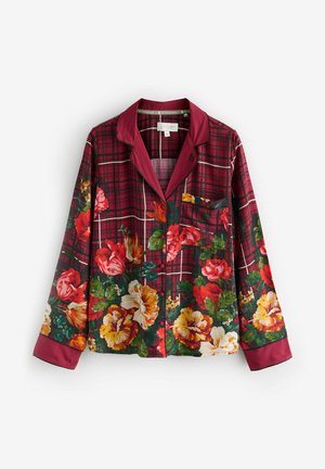 Camicia da pigiama a fantasia floreale con un design a quadri bordeaux e fiori vivaci in rosso, giallo e verde. Colletto e polsini in satin.