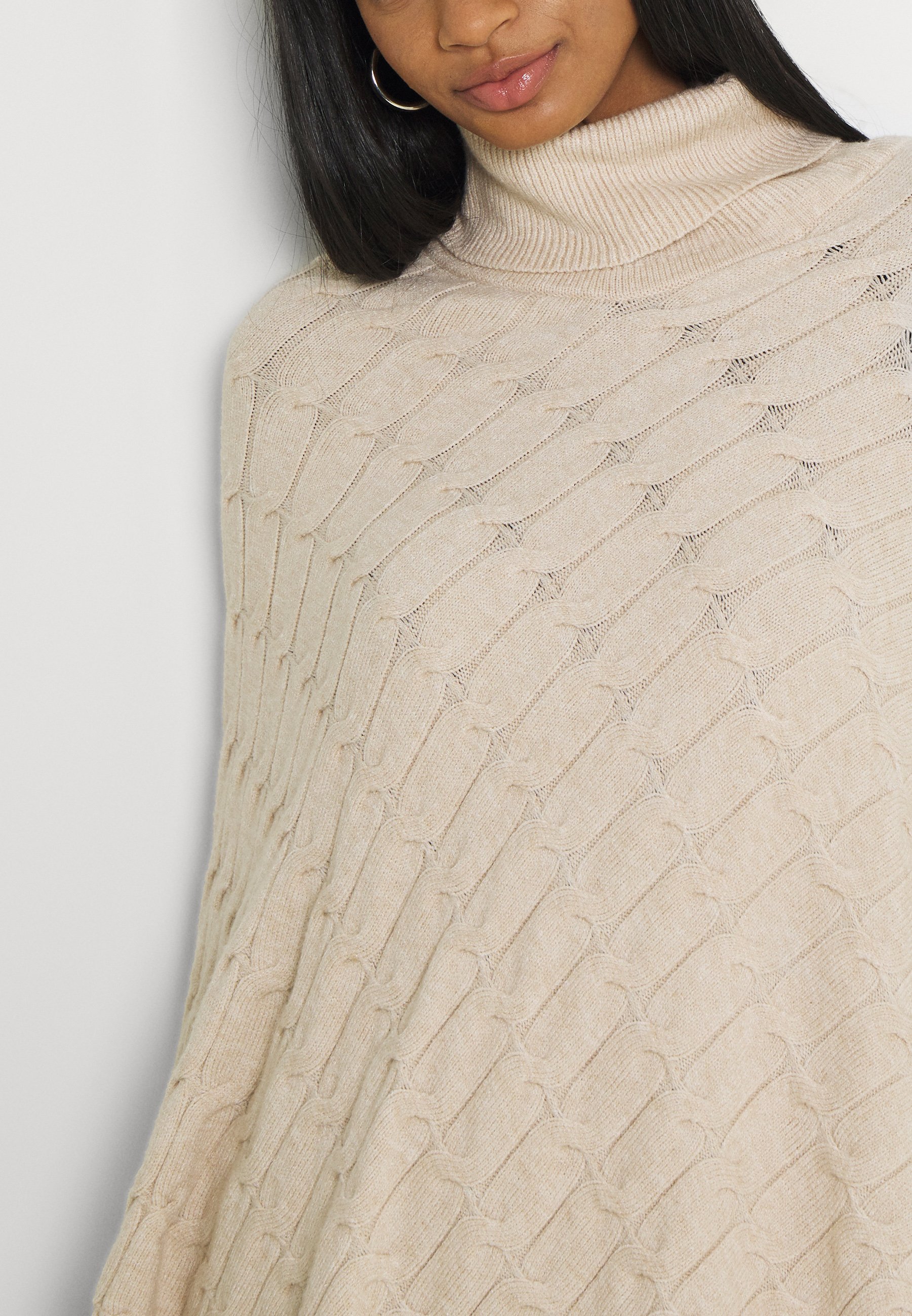 Women RUBY CABLE KNIT PONCHO - Cape Women RUBY CABLE KNIT PONCHO - Cape