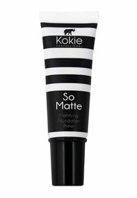 Svartvit randig tub med en svart bas, märkt "So Matte Mattifying Foundation Primer" med en liten elefantgrafik.