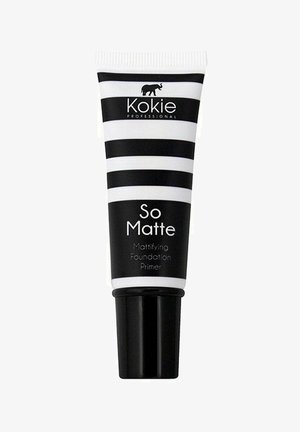 Musta ja valkoinen raidallinen putki mustalla pohjalla, jossa on teksti "So Matte Mattifying Foundation Primer" ja pieni elefanttigrafiikka.