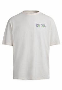 Hellbeige Baumwoll-T-Shirt mit kurzen Ärmeln und Rundhalsausschnitt. Auf der Vorderseite befindet sich ein grafisches Design in Lila und Grün.