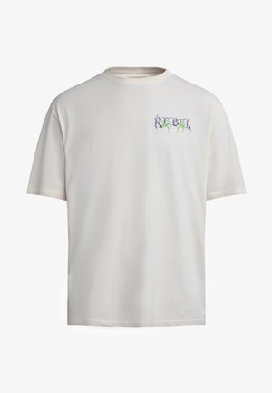 T-shirt in cotone beige chiaro con maniche corte e scollo rotondo. Presenta un design grafico viola e verde sulla parte anteriore.