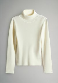Ribbed turtleneck-paita off-white-värissä. Ominaisuuksiin kuuluvat pitkät hihat, korkea kaulus ja tiivis siluetti, joka on valmistettu pehmeästä neulemateriaalista.