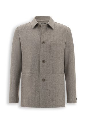 Veste marron clair à boutons devant, trois boutons, deux poches basses, une poche poitrine et un col classique.