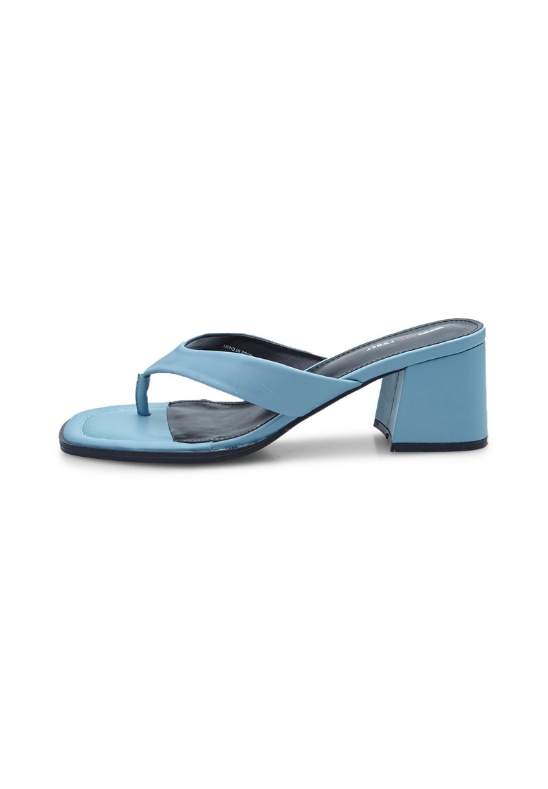 Light blue heeled sandals with a smooth material, open toe, and a triangular strap design. Thick block heel for stability.