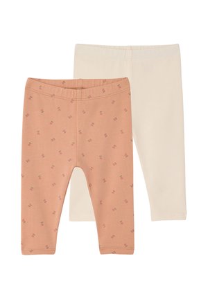 Zwei Baby-Leggings, eine beige und eine pfirsichfarben mit kleinem pinkfarbenem Blumenmuster, flach auf weißem Hintergrund ausgelegt.