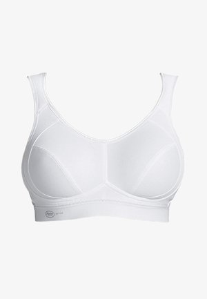 Hvid sports-bh med justerbare stropper, en bred kant og sømløse kopper, lavet af åndbart stof med forstærkede syninger.