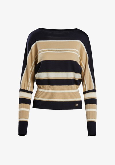 Dryžuotas mezgimo megztinis smėlio, nakties mėlynumo ir baltos spalvos. Savyje turi plačią apykaklę, raukšlėtą apačią ir ilgas rankoves su tekstūriniais akcentais.