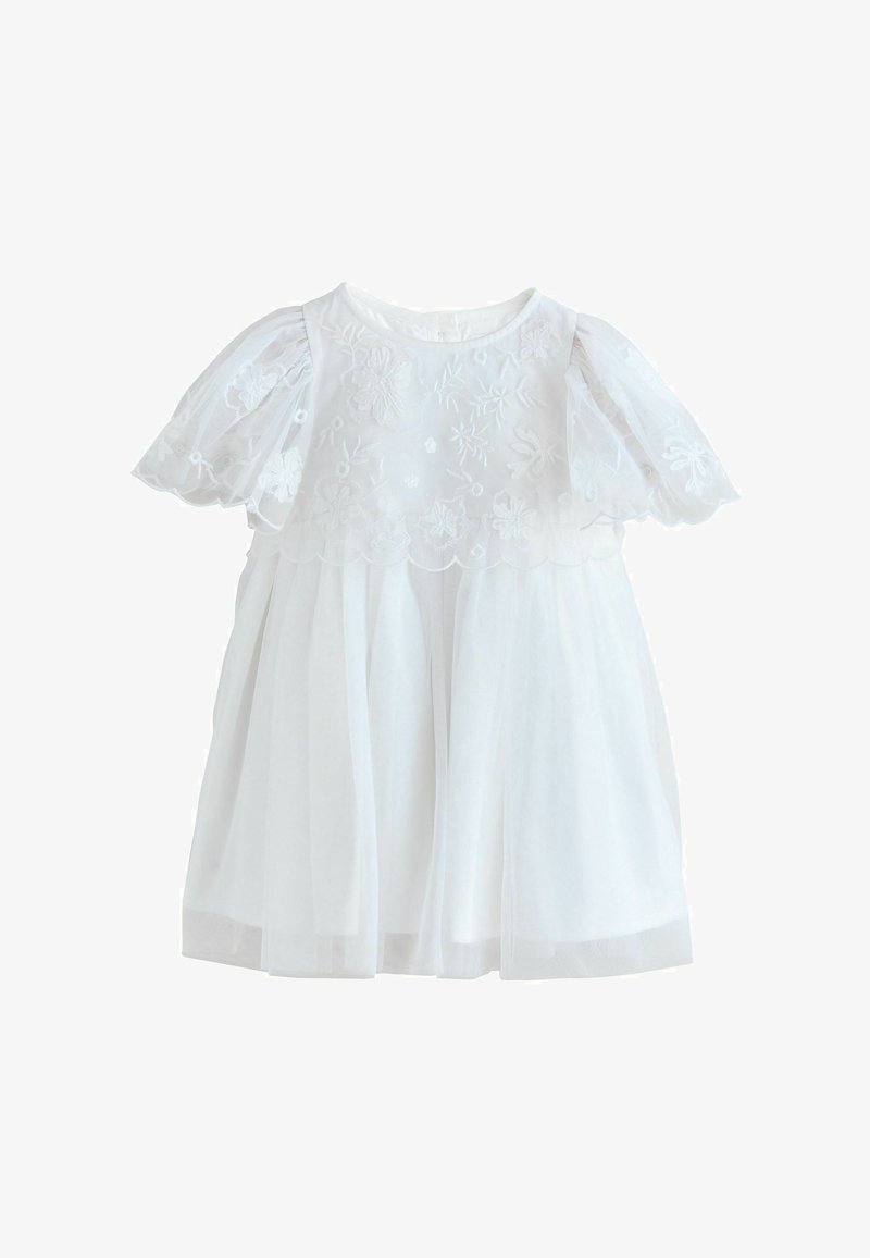 Robe blanche pour bébé avec manches courtes bouffantes, broderie florale sur le corsage et jupe transparente à plusieurs couches.