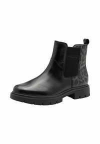 Botas Chelsea de cuero negro con laterales elásticos, parte trasera con estampado de leopardo texturizado, suela de goma gruesa y tirador en el talón.