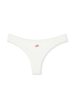 Tanga blanca con pequeño bordado floral en rosa y rojo centrado en la pretina frontal, sobre fondo blanco liso.