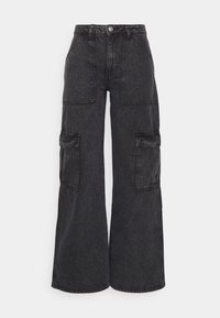 Black denim cargo pants with a wide leg design, featuring multiple pockets, a button closure, and contrast stitching for added detail.
