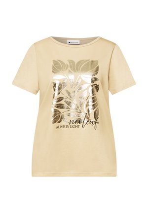 T-shirt beige a manica corta con grafica di foglia dorata lucida e scritta "ALIVE IN LIGHT neoleaf" sul davanti.