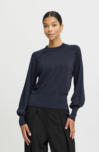 Navyblauer Pullover mit taillierter Passform, lockeren Ärmeln und einer subtilen Glitzertextur. Gerundeter Halsausschnitt, glattes Material und gerippte Bündchen.