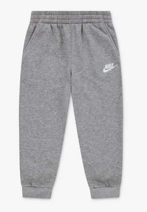 Grå Nike træningsbukser med elastisk linning og manchetter, sidelommer og hvidt Nike-logo på øverste venstre lår.