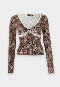 Καφέ και κρεμ μπλούζα με λεοπάρ μοτίβο, μακριά μανίκια, δαντελένια περίγραμμα γύρω από τον λαιμό και μαύρο κορδόνι στη μέση. Στενή εφαρμογή.