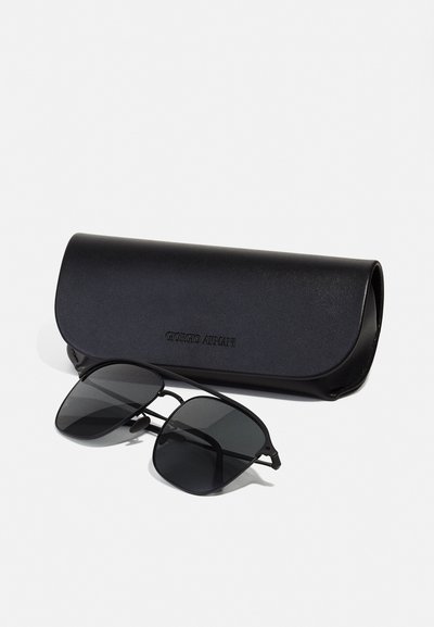 Black sunglasses with a rectangular shape, featuring black lenses and a sleek black case embossed with "Giorgio Armani." Smooth texture.