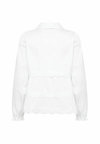 Biała bluzka z długim rękawem, z falistymi warstwami koronki z oczkami na plecach, marszczonymi mankietami i klasycznym kołnierzem.