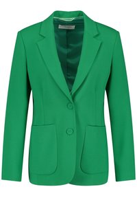 Blazer verde con solapa muesca, dos bolsillos frontales y dos botones. Textura suave con forro de satén. Diseño ajustado.