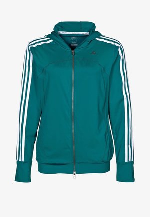Giacca cappuccio zip teal realizzata in tessuto liscio, con tre righe bianche lungo ciascun manica e un girovita aderente.