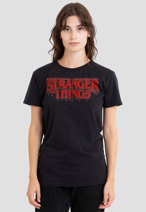 STRANGER THINGS RETRO DRIPPY LOGO - Print T-shirt - black