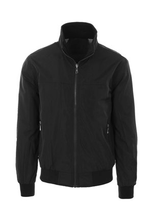 Giacca leggera nera con zip, collo alto, tasche laterali con zip, polsini elasticizzati e orlo elasticizzato su sfondo bianco.