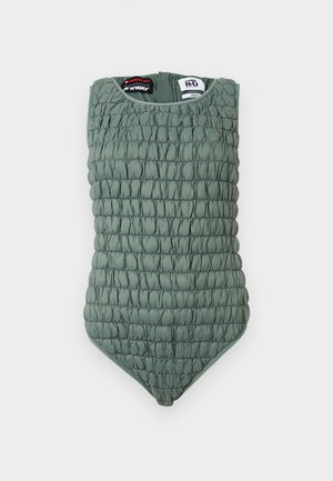 Quilted green sleeveless bodysuit with ruched texture, round neckline, and brand labels visible inside collar.