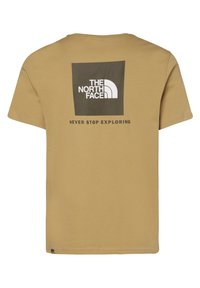 Kahvia kuitua t-paita, jossa on neliömäinen graafinen kuvasto, jossa on "The North Face" -logo valkoisena ja "NEVER STOP EXPLORING" -teksti alla. Lyhyt hiha.