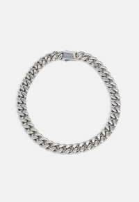 Polished silver thick curb chain necklace with a rectangular clasp engraved with the word "Palm".