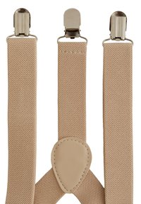 Bežové šle vyrobené z texturované látky, s kovovými sponami a koženým akcentem v centrálním upevňovacím bodě.