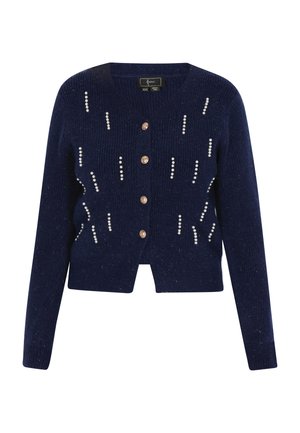 Tumesinine ribaga kardigan V-kaelusega, viis dekoratiivset nuppu ja pärliturvased, mis on paigutatud vertikaalselt esiosale. Lühike, keha lähedane disain.