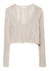 Korte beige cardigan met V-hals, lange mouwen, textuur van ribstof en verschillende open steekdetails. Vijf knopen aan de voorkant.