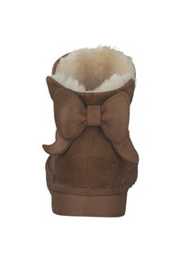 Brown suede ankle boot with a fluffy white interior, featuring a large accent bow at the back and a flat rubber sole.