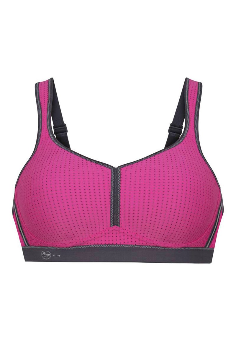 Różowy stanik sportowy z wzorzystą teksturą, kontrastującymi szarymi wykończeniami i zapięciem na zamek z przodu. Regulowane paski zapewniające dopasowanie i wsparcie.