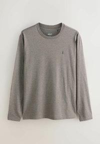 Long-sleeve gray T-shirt made of soft material, featuring a round neckline and a small emblem on the left chest. Simple design, no patterns.
