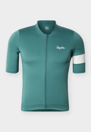 Kortermet turkis sykkeltrøye med frontglidelås, hvit armstripe på høyre erme, og "Rapha"-logo på venstre bryst.