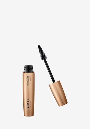 Avoin KIKO Milano Volume Eyes+ -ripsivärituubi, jossa musta harjasovitin, kultaisenvärisen sylinterimäisen säiliön vieressä.