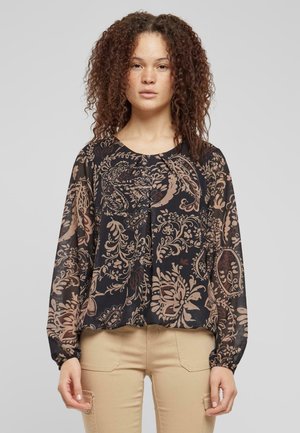 Blusa nera e trasparente con intricate fantasie floreali marroni, maniche lunghe e scollatura rotonda. Presenta un dettaglio di tessuto arricciato nella parte anteriore.